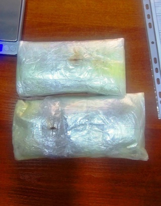 Оёқлар орасига яширилган “опий” фош бўлди