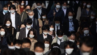 Японияда коронавируснинг учинчи тўлқинида навбатдаги антирекорд қайд этилди