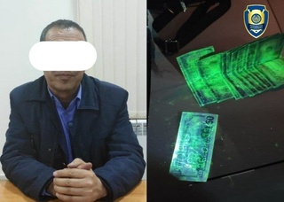 Fuqaroni ishga kiritib qoʻyganligi evaziga 2 000 AQSH dollari talab qilgan er xotin ushlandi