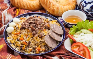 How much does it cost to cook 1 kilogram of plov in Uzbekistan?
