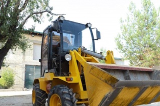 Наманганлик йигит бир нечта вазифани бажарувчи трактор яратди