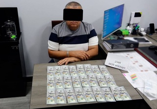 В Ташкенте задержан руководитель подразделения уголовного розыска при получении 2,5 тысячи долларов