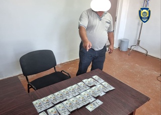 Xorazmda turar-joy binosiga kadastr hujjatlarini rasmiylashtirib berishni vaʼda qilgan firibgar ushlandi