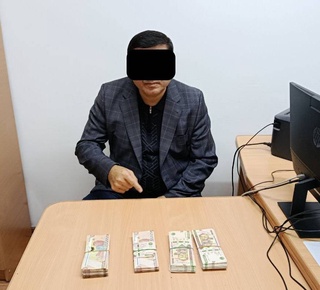Сотрудник Навоийского государственного университета задержан за получение взятки