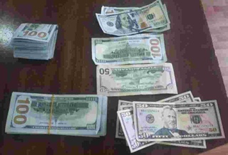 Qalbaki salkam 11 ming AQSH dollarini muomalaga chiqarmoqchi boʻlganlar ushlandi