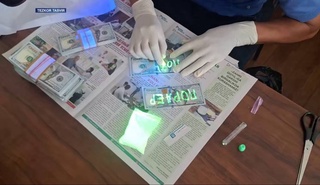 В Каракалпакстане замхокима задержан при получении крупной взятки за выделение земли