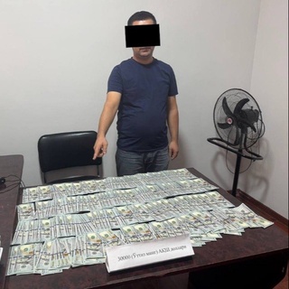 Soliq idorasi xodimi pora olgan paytda qoʻlga olindi