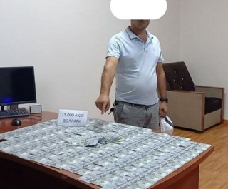 Тадбиркорга аукцион савдоларисиз бино олиб беришни ваъда қилган собиқ мутахассис ушланди