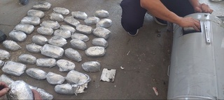 Автомашина ёқилғи бакларига яширилган 55 кг.га яқин гашиш ва героин фош қилишди