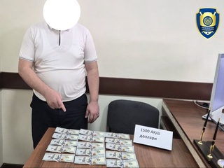 Наманган шаҳрида Халқ қабулхонаси ходими пора билан ушланди