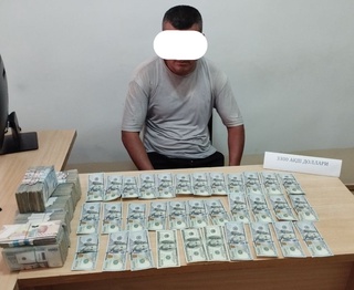 Чет эл валютасини ноқонуний муомалага киритмоқчи бўлганларга жиноят иши қўзғатилди