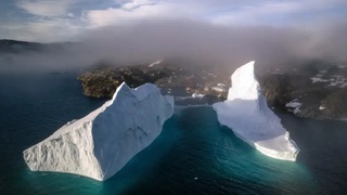 A giant iceberg has come very close to a village in Greenland