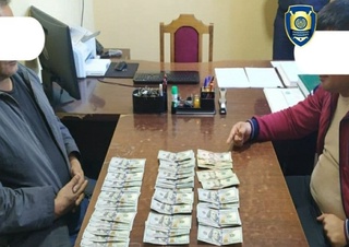 Ҳазорасп туманида захирадаги ер майдонини сотмоқчи бўлган фирибгарлар ушланди