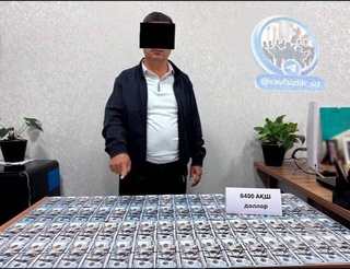 Дар вилояти Тошканд ҳангоми гирифтани пора мушовири калони ҳуқуқии «Хадамоти ягонаи фармоишгар» боздошт шуд