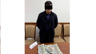 Ҳангоми гирифтани пора ба маблағи 3 ҳазор доллар корманди ҳокимияти ноҳияи Учтепа боздошт шуд