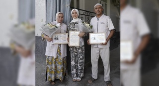 Nemis tilidan oltin medal olgan andijonlik qizning ota-onasiga Umra ziyoratiga yoʻllanma berildi
