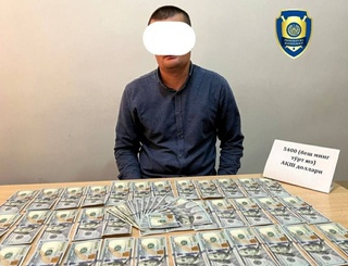 Tadbirkordan 5 400 AQSH dollari pora talab qilgan bosh mutaxassis ushlandi