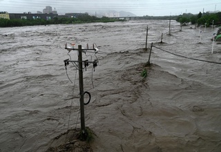 Пекинда сув тошқинлари қурбонлари сони 11 кишига етди