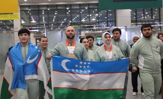 Domestic weightlifters who successfully performed at the World Cup in Colombia were solemnly welcomed at home