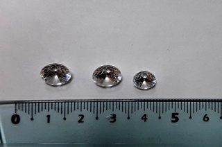 Қимматбаҳо тошлар ҳамда қадимий танганинг савдоси билан шуғулланган жиноий гуруҳ фош этилди