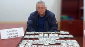 Қашқадарёда қалбаки 5 минг АҚШ долларини 25 млн сўмга сотмоқчи бўлган шахслар ушланди