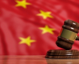 Хитойда пора олган амалдор ўлим жазосига ҳукм қилинди