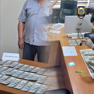 В Ферганской области задержаны лица, пытавшиеся получить 5000 тысяч долларов за оформление земельного участка