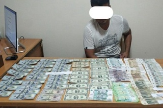 Иштихон ва Нукус туманларида ноқонуний валюта айирбошлаш фаолияти билан шуғулланиб келган фуқаролар ушланди