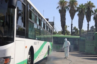 Россия ҳарбий кучлари Алеппода автобусларни дезинфекция қилишни бошлади