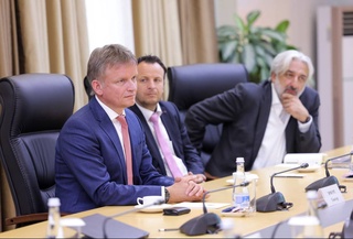 The focus is on investments in alternative energy