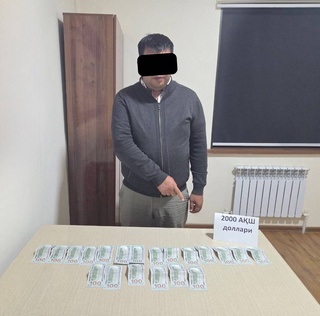 В Каракалпакстане начальник кадастрового отдела задержан при получении взятки