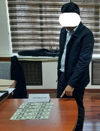 Асака тумани ҳокимлиги юрисконсульти фирибгарлик жинояти устида ушланди