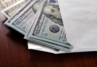 200 ming AQSH dollari talab qilgan firma rahbari 100 ming dollar olgan vaqtida ushlandi