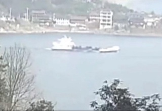 In China, two people died in a riverboat collision