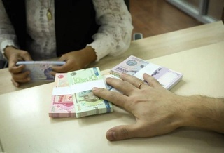 Өзбекстанда жумыстан артықша жумыс ушын ҳақы төлеў тәртиби жетилистирилди