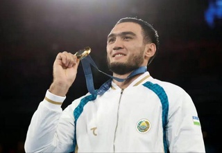 Олимпийский чемпион по боксу Лазизбек Мулложонов временно отстранен за допинг