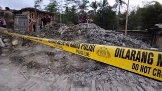 A boarding school building collapsed in Indonesia, killing one person and injuring over 100