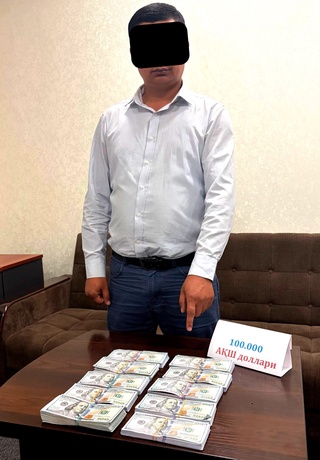 Toshkent viloyatida bank xodimi 100 ming dollar olgan vaqtida ushlandi