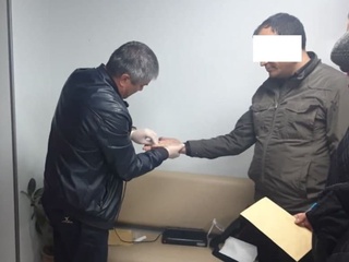 Тадбиркордан пора олаётган Кадастр агентлиги Янгийўл туман бўлим бошлиғи ушланди